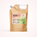 A brown kraft paper resealable pouch with a white handle cutout and a printed front label reading 'PREPOST BIOTIC ROSE WATER' and 'Radeq Lab'. The pouch is photographed upright on a clean white background with a soft shadow.