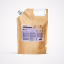 A brown kraft paper stand-up pouch of Radeq Lab Prebiotic Soothing Milk with a white handle cutout and a white spout cap, shown on a clean white background.