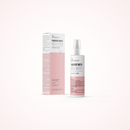 A bottle of Radeq Lab Pre and post Biotic Rose Water home care spray next to its matching pink and white packaging box, set against a clean, solid pale pink background.